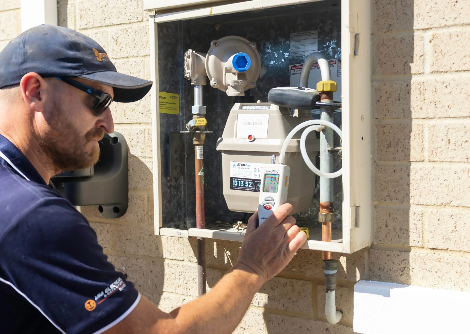 Gas plumber at outdoor gas meter