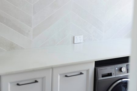 laundry renovation ideas. laundry storage, splashback tiling