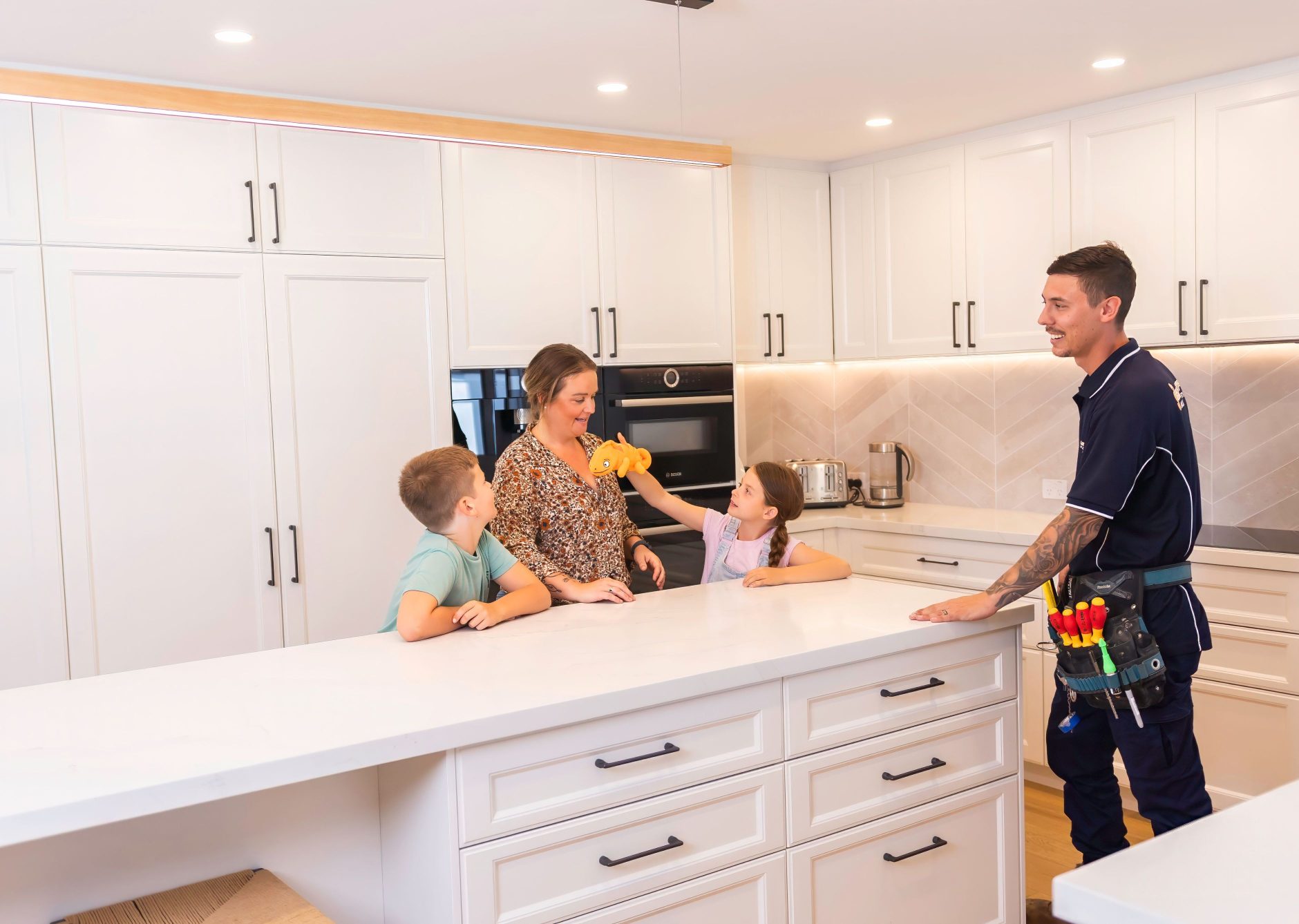Happy customer in new modern kitchen