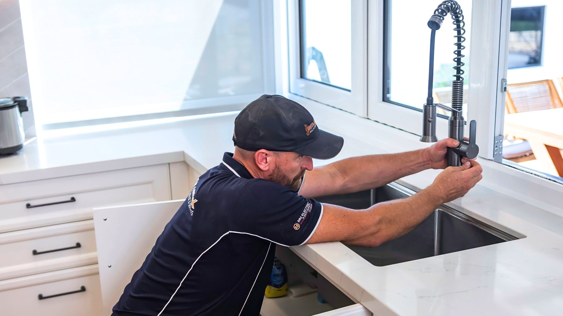 Smartfix Perth plumbing installing a kitchen tap