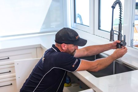 Smartfix Perth plumbing installing a kitchen tap